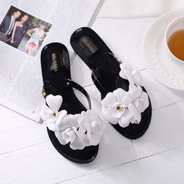 Slippers 2022 NEW Camellia Jelly Slippers EUR Szie 36-40 Outside Women Sandals Female Sun Beach PVC Flower Flip Flops 2 Colours L230215