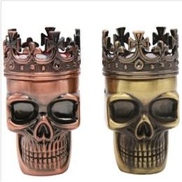 Skull shaped plastic smoke grinder, three metal smoke grinder, manual smoke cutter.
