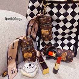 Designer Keychain Luxury Leather Bucket Lipstick Bag Silk Scarf Keychain Exquisite Personalised Storage Bag Pendant Women Accessor234e