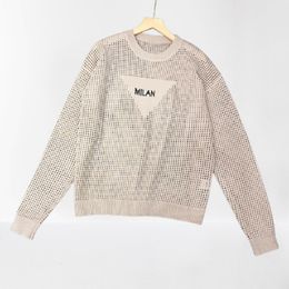 Kvinnors stickor lyxiga deisgner t skjortor netto spets tees med ihålig frambrev broderi lös tråkig bekväm personlighet trendiga långärmade stickor mode tees