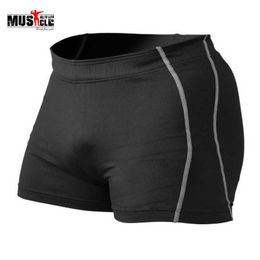 Men's Shorts 2022 Gyms Shorts Mens Bodybuilding Muscle Clothing Shorts Polyester Spandex Solid Skinny Shorts Body Black Orange Fitness Shorts Z0216