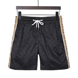 Mens Swim Shorts Mens Summer Designer Shorts Fashion Loose Swimming Suits Womens Slim Style Clothing Quick Drying Swimwear Letters Printed Board Beach Pants