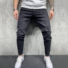 Jeans da uomo Uomini e giovani Slim Fori rotti Stile consumato Piedi piccoli stretti Leggermente elastico Colore puro Moda semplice All-Fiammifero