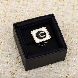 2023 Luxury quality charm punk band ring with black and white Colour design in 18k gold plated have box PS3277