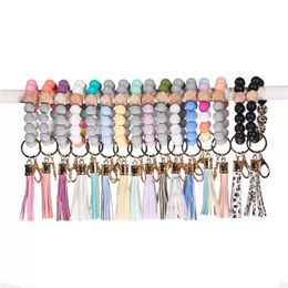 Stock Party Favor Wooden Tassel Bead String Bracelets Keychain Silicone Beads Women Girl Key Ring Wrist Strap for Car Chain Wristlet Beaded Portable Gifts DHL