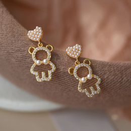 Korean version girl sweet cool pearl earrings temperament fashion OL cute bear earrings personality thin versatile earrings