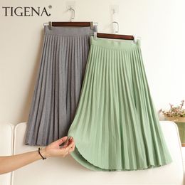 Casual Dresses TIGENA Korean School Knit Midi Skirt Women Fashion Autumn Winter Casual Knee Length High Waist Pleated Skirt Female Green 230222