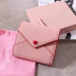 2023 New designer women's purse niche new folding change sheepskin short style everything simple cute mini student card bag
