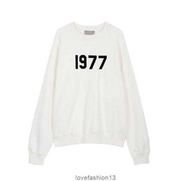 2023mens Designer Sweatshirts Hoodies Ess 1977 on Front Hooded for Man Women Fog God of Fear Multi Thread Flocking High Street Rd8b