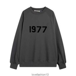 2023mens Designer Sweatshirts Hoodies Ess 1977 on Front Hooded for Man Women Fog God of Fear Multi Thread Flocking High Street 3xai