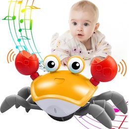 Science Discovery Crawling Crab Sensory Tummy Time z muzyką LED Light Up Indukcja Escape Fujao Birthday Prezenty Drop 230227