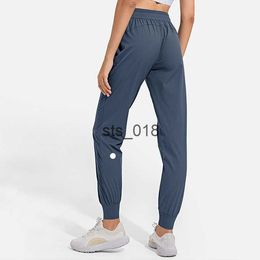 Yoga Outfit LL Women Jogging Yoga Ninth Pants Pocket Fitness Soft High Waist Hip Lift Elastic Casual Pants Drawstring Legs Sweatpants T230228