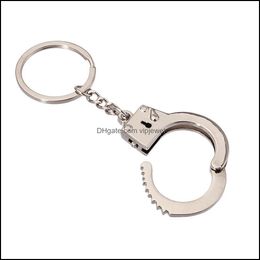 Key Rings Simation Handcuffs Metal Keychain Car Bottle Opener Men And Women Drop Delivery Jewelry Dhcdg