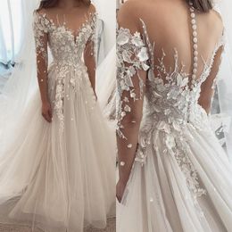 Splendidi abiti da sposa in tulle di pizzo 2022 Appliques sexy con collo trasparente e bottoni ricoperti sul retro Illusion Manica lunga A-line da sposa Gow284l