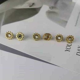 80% di sconto gioielli di design bracciale collana anello orecchini asimmetrici fiore fare girasole vecchio stile