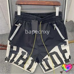 Men Shorts Black Rhude Mesh Shorts Men Women 1 Quality Pill Zip Pockets Slightly Oversize Premium Nylon Flight Breeches 8rgm HJ01 Gym Work