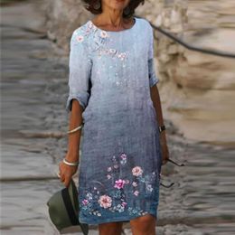 Abito da donna in lino di cotone Abito estivo a maniche corte con scollo tondo Mini abito con stampa floreale Abito da spiaggia Boho allentato oversize Vestido