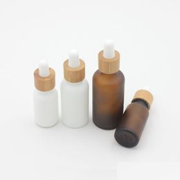 Packing Bottles Frosted Amber White Glass Dropper Bottle 15Ml 30Ml 50Ml With Bamboo Cap 1Oz Wooden Essential Oil Drop Delivery Offic Dhfbm