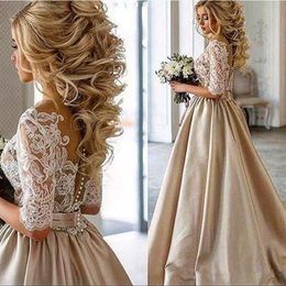 2020 New Vintage Lace Stain Champagne Wedding Dresses Half Sleeve Sheer Neck Covered Botton Cheap Dubai Arabic Bridal Gown Real Ph253g