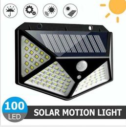 100 led solar motion lights 3 mode 100led solar interaction wall lamp with 18650 battery outdoor camping emergency flashlight torch lantern