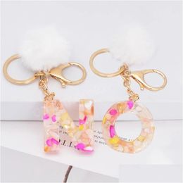 Key Rings 26 Initials Letter Pendant With White Fluffy Pompom Fashion Girls Handbag Glitter Gradient Resin Alphabet Keychain Charms Dh0Ye