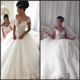 Luxury Beaded Ball Gown Wedding Dresses Short Cap Sleeves Lace Applique Sheer Neck Illusion Floor Length Wedding Gowns vestido de 206O