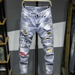 Men's Designer Fashion Trousers Ground White Spray Painted Jeans Men Luxury Brand with Holes Quality Holes