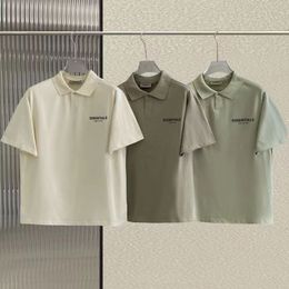 Essentail Hoodie Designer Trend Polo Рубашка для рубашки грудь печать с коротким рукавом высокая улица свободная повседневная 100% хлопковые мужчины и женщины с той же рубашкой для рубашки поло.