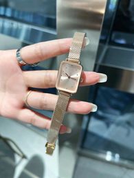 Luxurious and fashionable women's diamond watch hollowed out multi-functional quartz movement cowhide belt