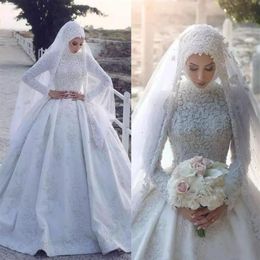 Gorgeous Lace Appliqued Muslim Ball Gowns Wedding Dresses 2018 White Beaded High Neck Arabic Dubai Puffy Long Sleeve Bridal Gowns 2913