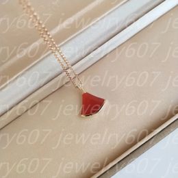 Best Seller Simple design small fan small skirt necklace pendant inlaid with carnelian agate gold plated high quality small exquisite lovely pendant gif Hot Sale