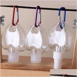 Packing Bottles 50Ml Heart Shape Hand Sanitizer Bottle With Keyring Hook Clear Transparent Plastic Refillable Containers Christmas G Dh7X2