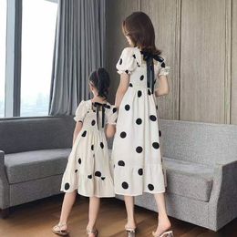 Family Matching Outfits Mother and Daughter Polka Dot Dresses Summer Fashion Children's Clothing Small Fresh Puff Sleeve Parentchild Princess Dress 230608