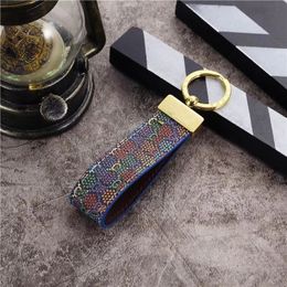 High Quality leather Keychain Classic Exquisite Luxury Designer Car Keyring Zinc Alloy Letter Unisex Lanyard Gold Black Metal Small Jewellery gift Box 9 Colours