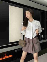 Skirts Designer high-end 23 early spring casual fashionable waistband drawstring metal buckle pocket cover short half skirt O7YP