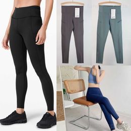 Pockets Women Yoga Naked Trouser Exercise Long Pant Soft Sanding Fitness Legging Elasticity Jogging Yogas Pants High Rise Upturned buttocks