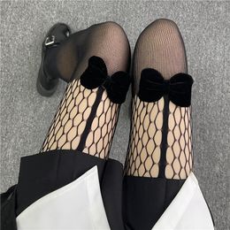 Women Socks 2023 Sexy Bow-knot Hollow Out Fishnet Stockings Nigh Club Party Nylons Black Mesh Lingerie Sheer Pantyhose Fishnets