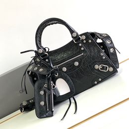 Neo Cagole XS Handbag black Arena shoulder bag leather motorcycle Trapezoidal shape hand-braided handles women designer luxury purse