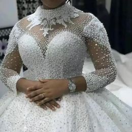 Arabic Dubai Women's Wedding Dress 2023 High Neck Illusion Long Sleeves Beads Pearls African Puffy Princess Bridal Gown Vestidos De Novia Custom Made