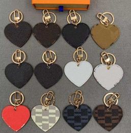 New 23ss Classic Luxurys Keychain Heart shape Brown black Designer Car Keyring Womens Handmade Fashion brand Keychain