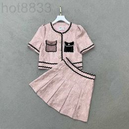 Two Piece Dress Designer 23 Summer New Style Simple and Stylish Contrast Color Dual Pocket Short Sleeve Top with Half Skirt Casual Set VKCS