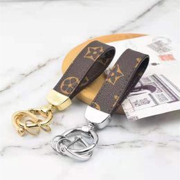 Multifunctional leather key fashion lanyard cute wallet rope chain couple pendant small gifts whole Variety of styles3682912283a