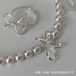 Chenmo overseas niche 925 sterling bow ring simple and elegant gentle personality easy to match with plain silver