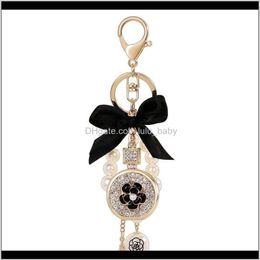 Lovely Cute Bow Pearl Flower Perfume Bottle Fashion Ins Luxury Designer Diamond Rhinestone Bag Charms Tassel 8Zlh6 Nen2Y5979651211S