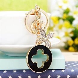 Keychains Beautiful Fourleaf Clover Keychain Exquisite Metal Fashion Car Pendant Key Ring Women039s Bag Charm Gift8194362262B