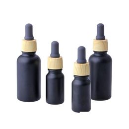 Packing Bottles Matte Black Glass E Liquid Essential Oil Per Bottle With Reagent Pipette Dropper And Wood Grain Cap 10/30Ml Drop Del Dhrz7