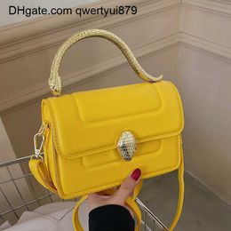 Designer Women's Brand new grils handbag texture fashion simple one-shoulder bags Western style metal portable snake head small square bag multicolor