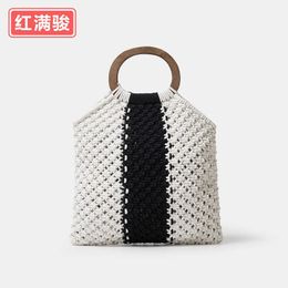 Handmade cotton thread woven bag for women with contrasting stripes, hollowed out wooden handle handbag, niche seaside vacation handbag 230615
