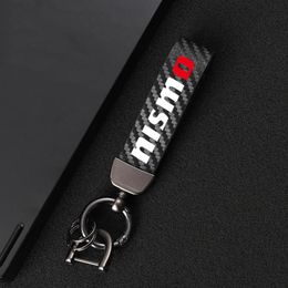 Keychains Carbon Fiber Leather Keychain 360 Degree Rotating Horseshoe Key Rings For Nissan Nismo Tiida Teana Skyline XTrail Qashq8293d