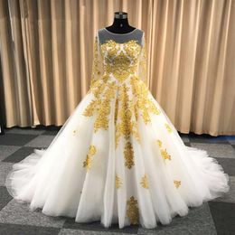 Affascinante abito da sposa in pizzo oro bianco Abiti maniche lunghe Appliques Collo gioiello Paillettes sul retro Abiti da sposa Real Po285S